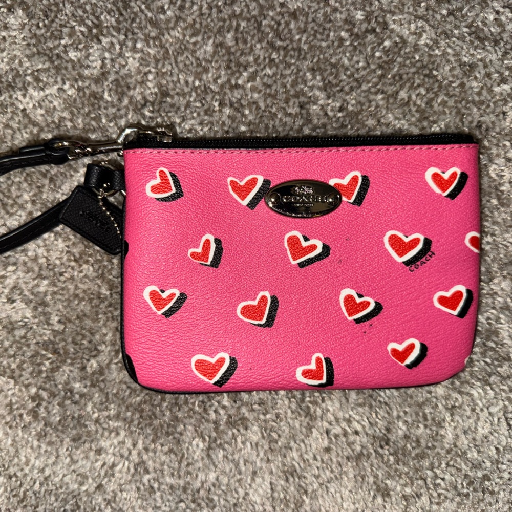 Coach Pink Wristlet with Heart Motif